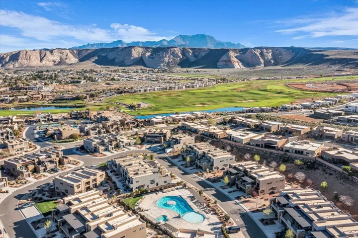 Bird's eye view of a water and mountain view and a local golf course