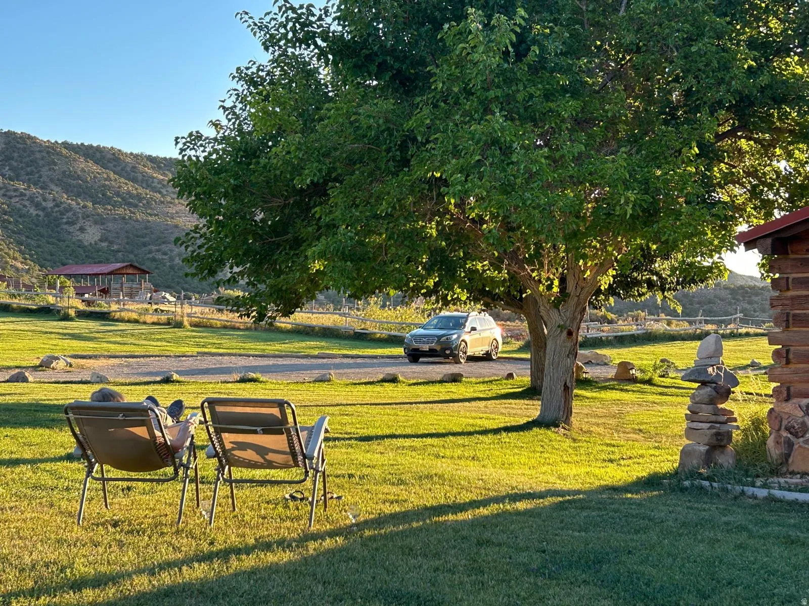 View of grassy yard featuring a mountain view