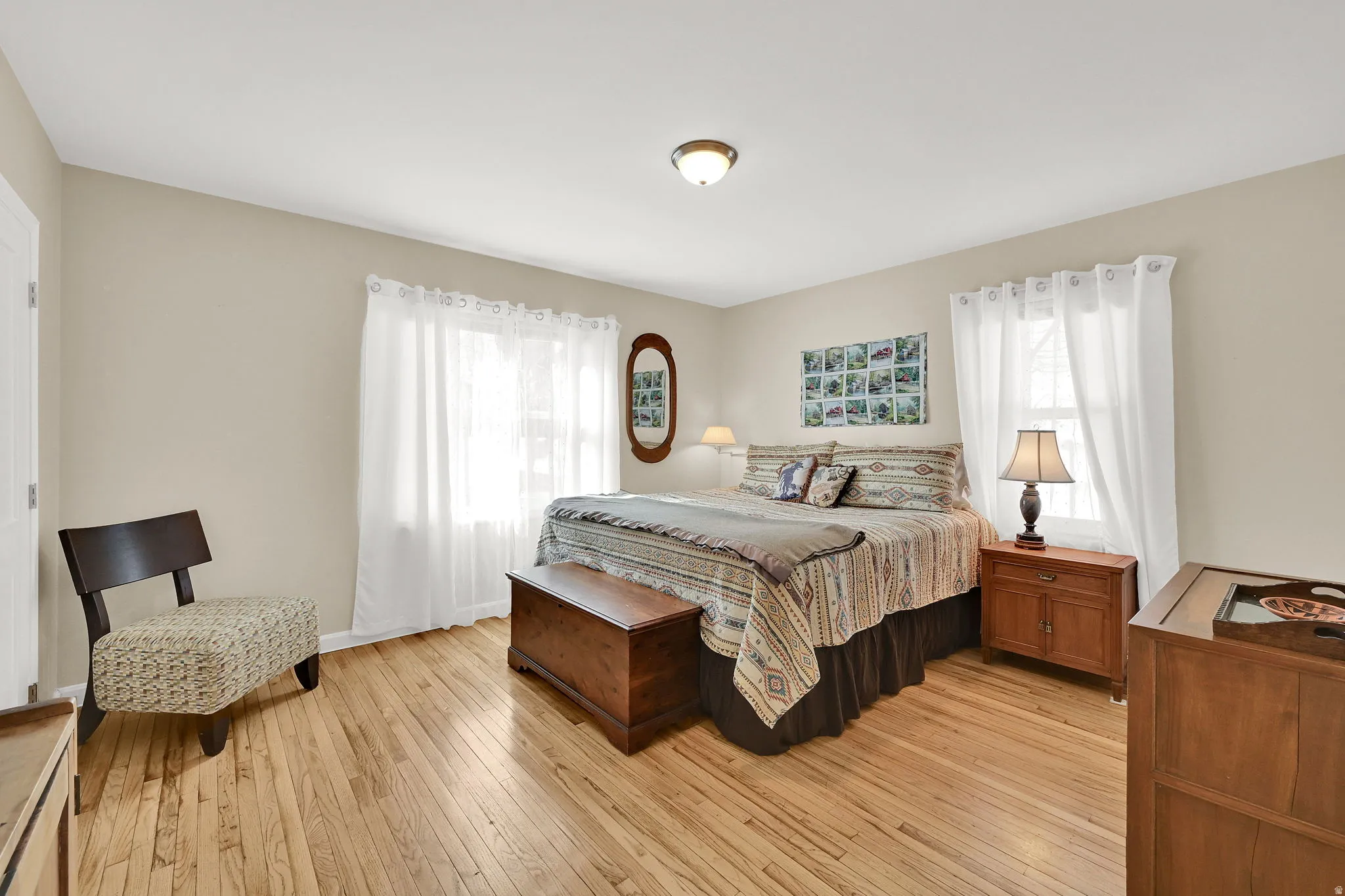 Spacious primary bedroom with 2 closets and en-suite bathroom