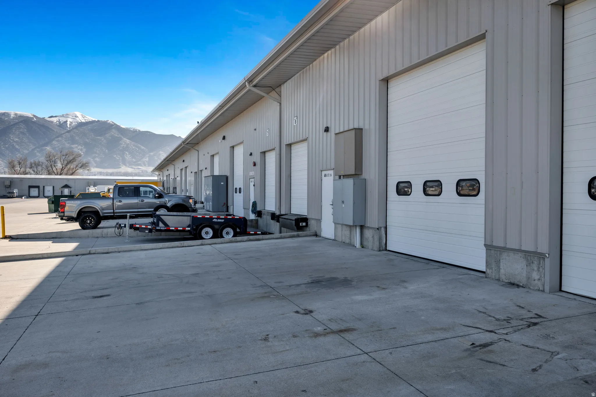 Garage featuring a mountain view