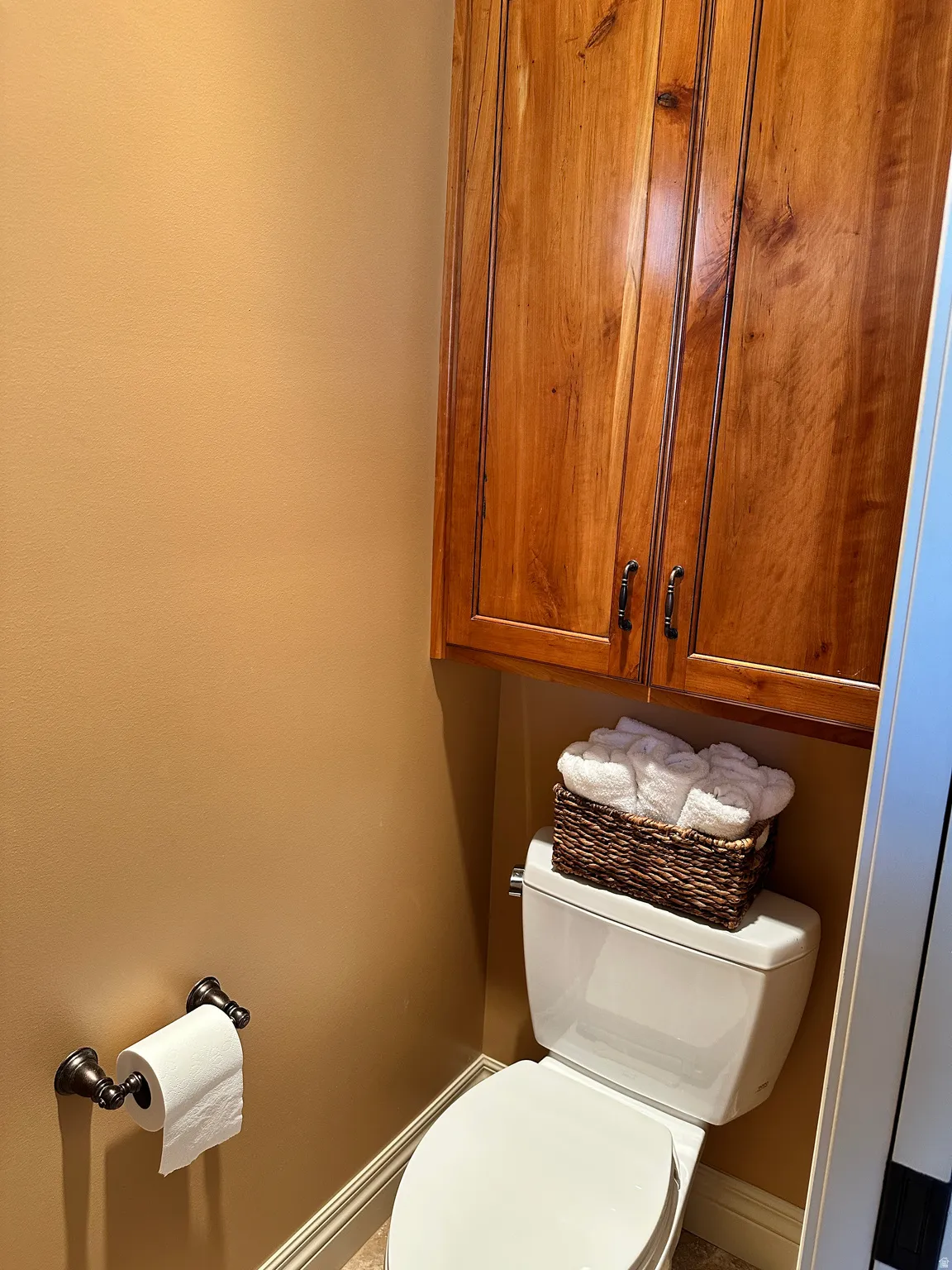 Bathroom with toilet with cabinet