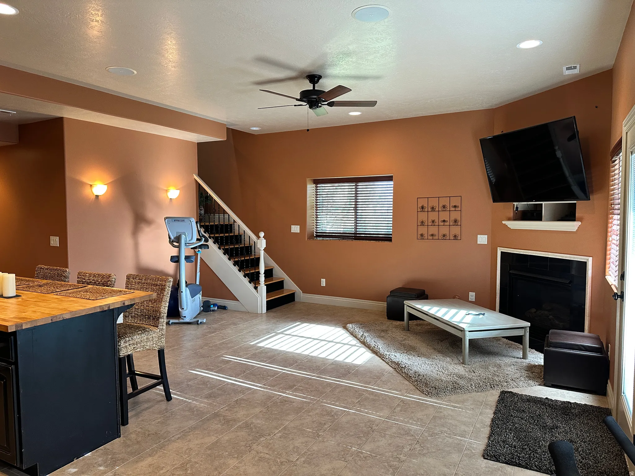 Basement family room with gas fireplace