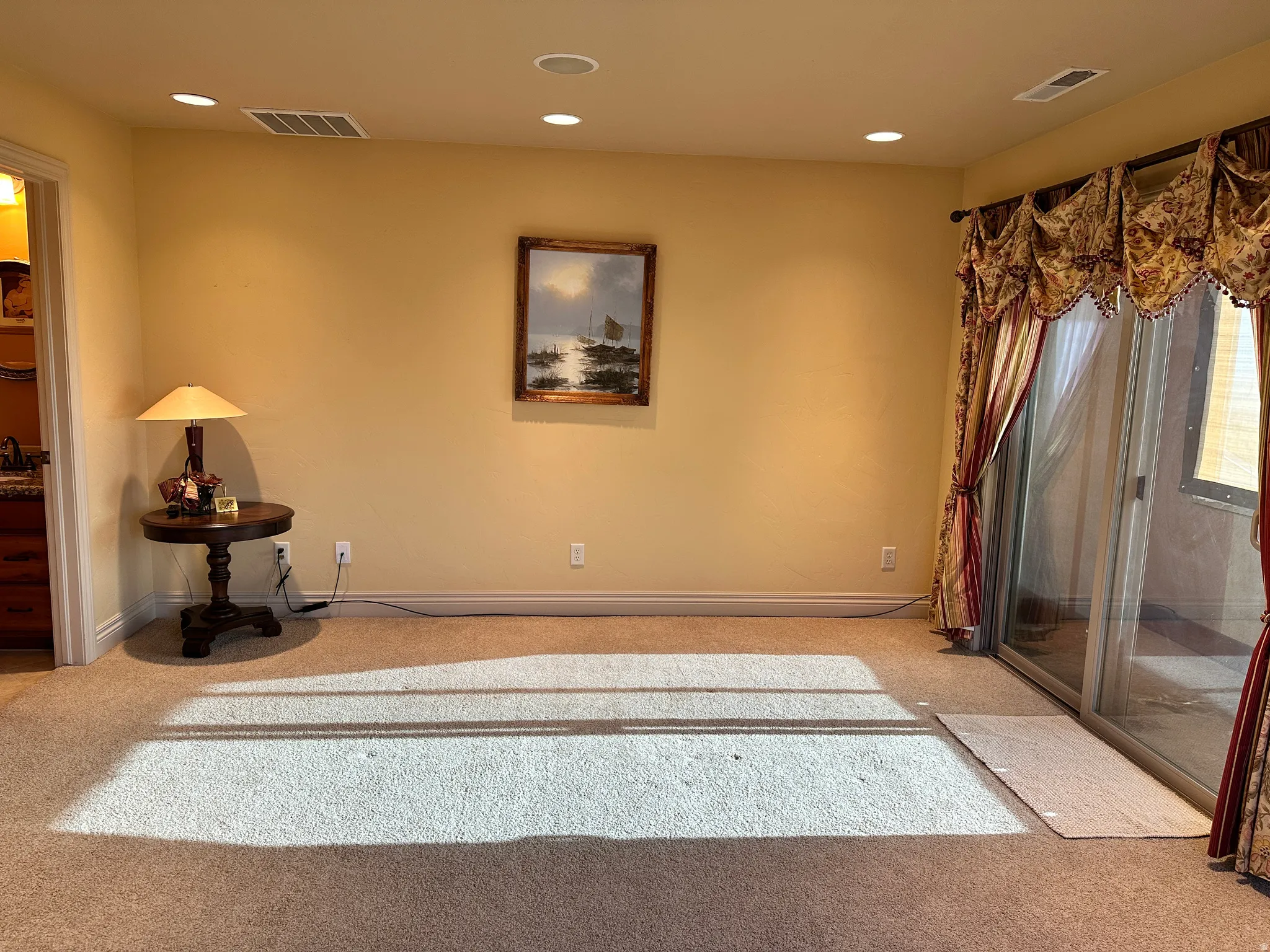 Bedroom on upper level with balcony overlooking Willard Bay