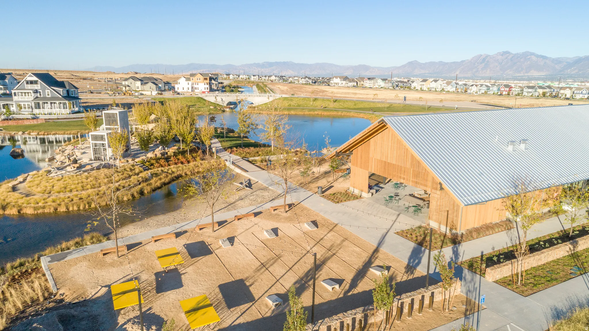 Aerial view of residential area featuring a water and mountain view
