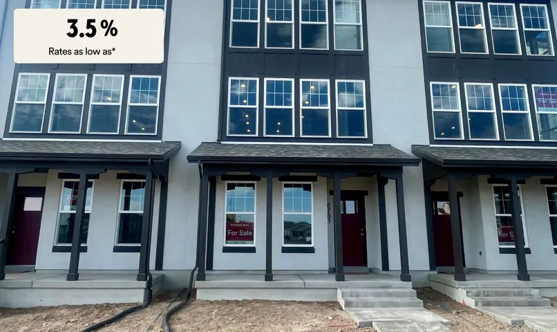Doorway to property featuring roof with shingles, stucco siding, and covered porch