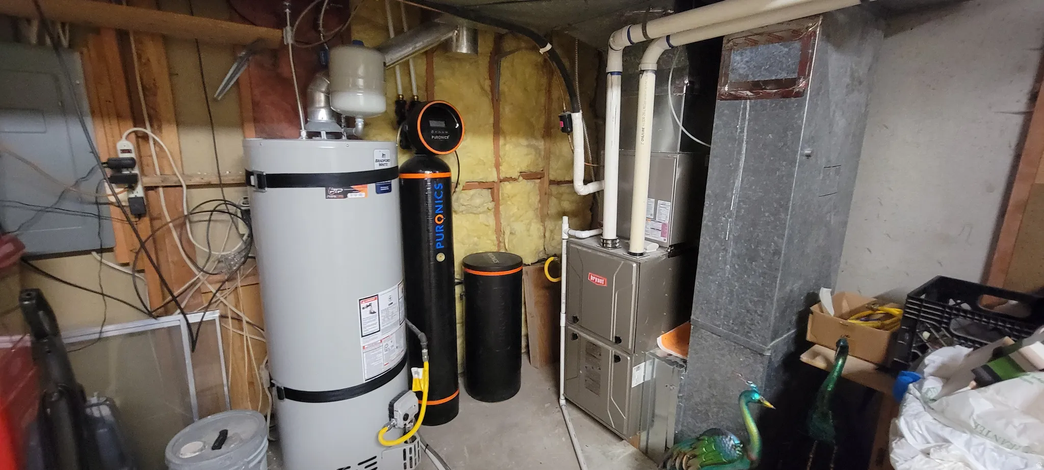 Utilities with strapped water heater and heating unit