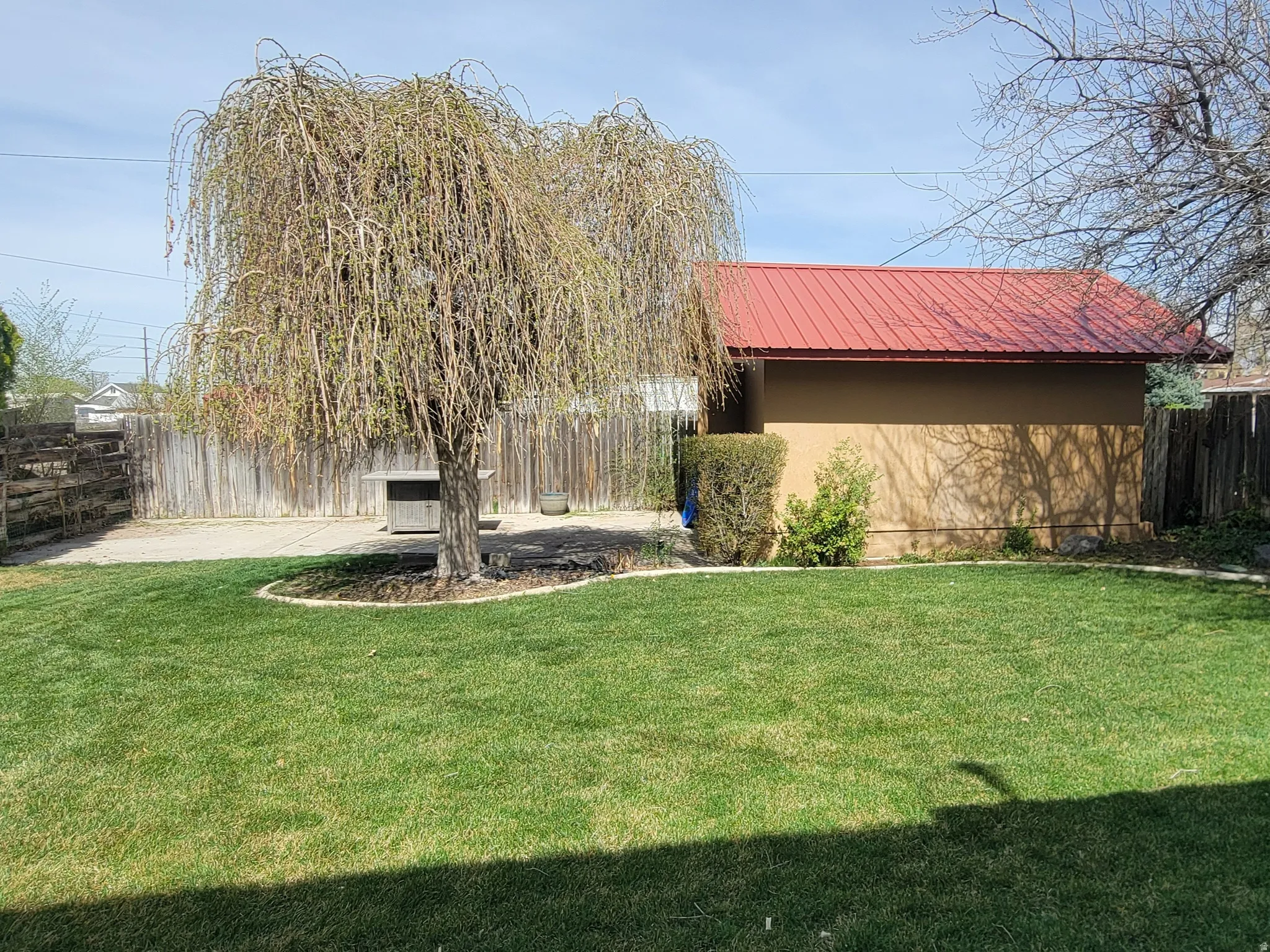 View of fenced backyard