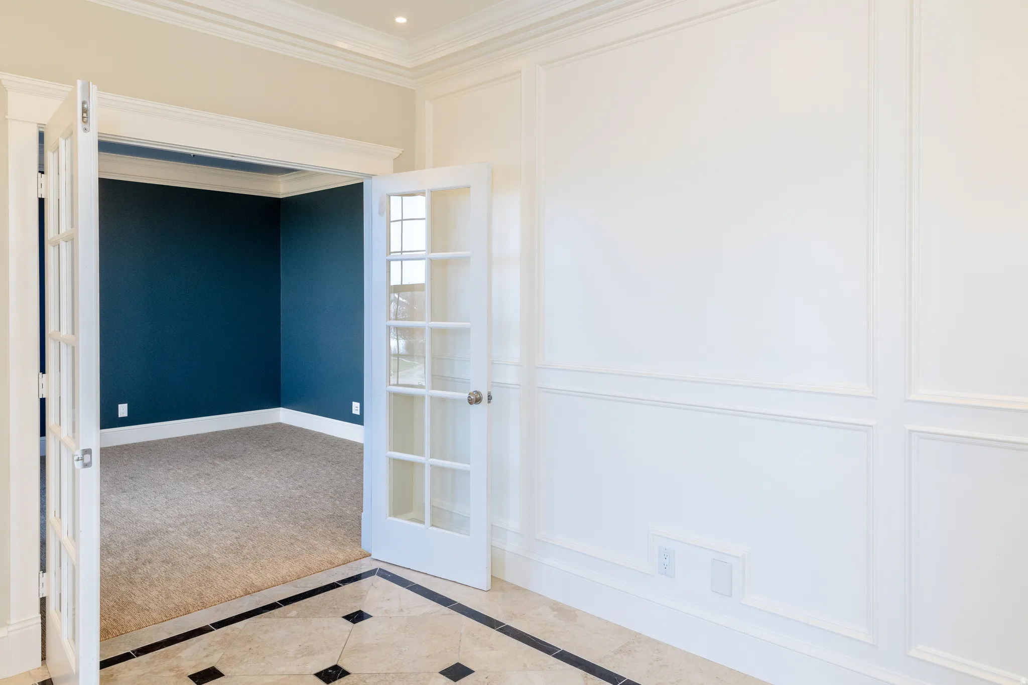 crown molding, French doors, and recessed lighting