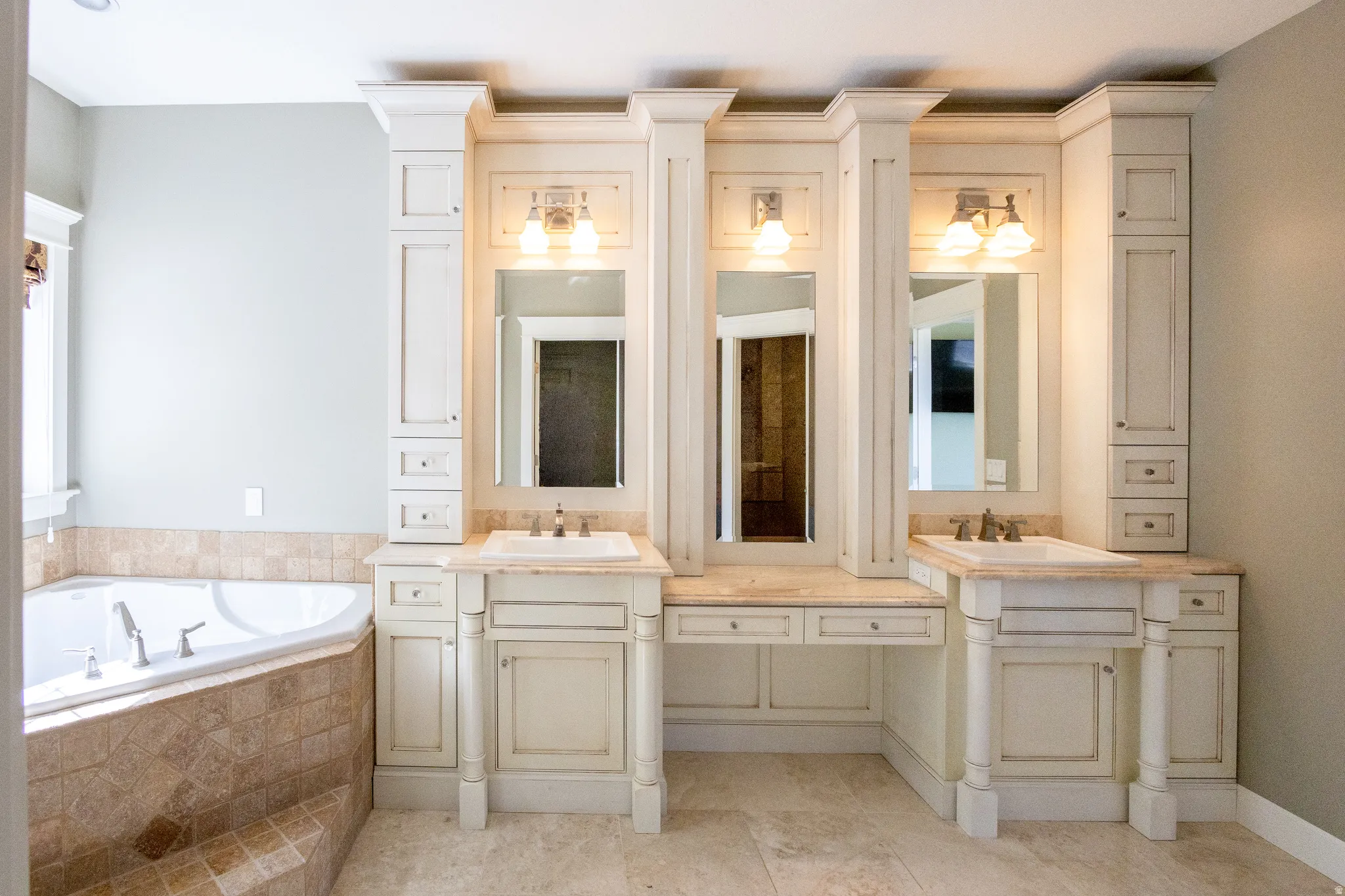Bathroom with double vanity and a garden tub