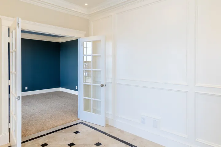 crown molding, French doors, and recessed lighting