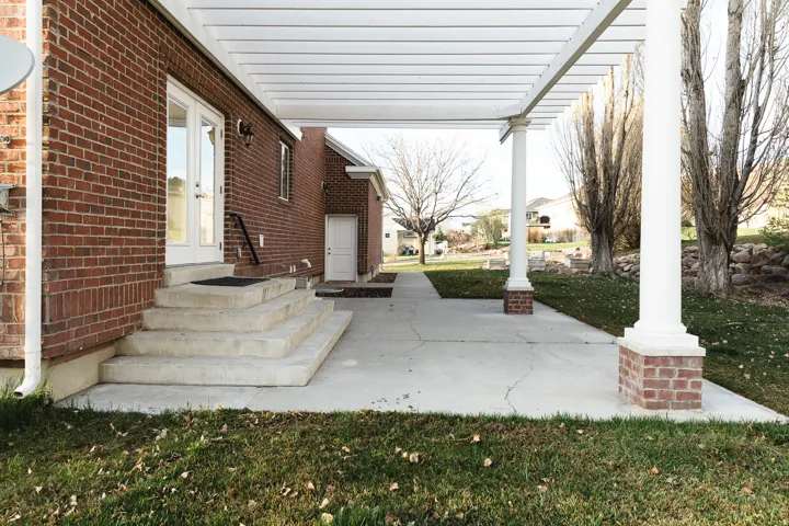 View of patio / terrace featuring entry steps and a residential view