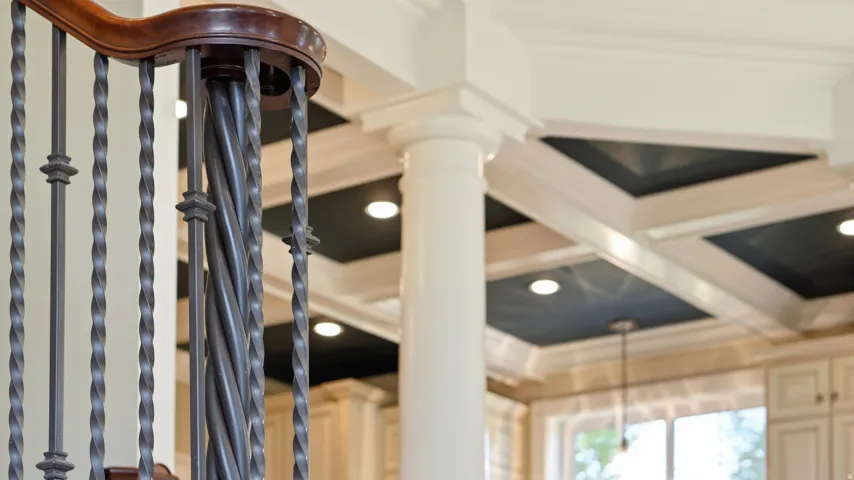 Dark wood-finish handrail with wrought iron balusters