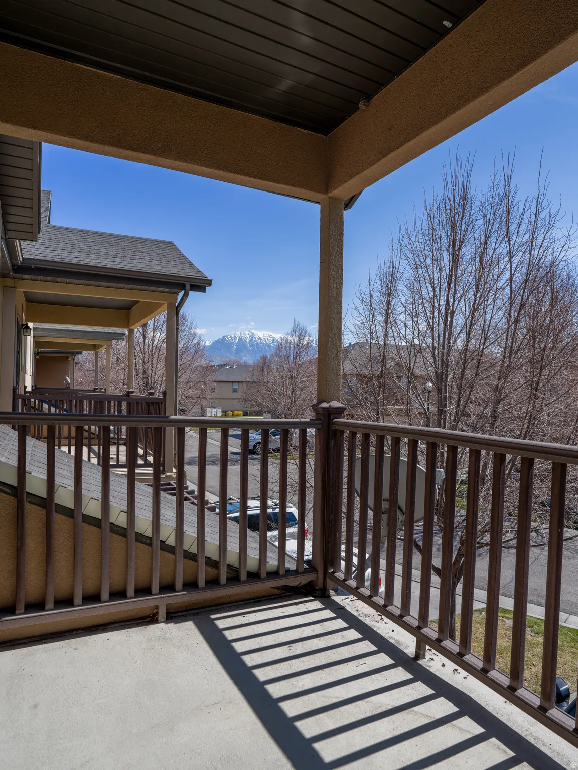 Wooden deck featuring a mountain view