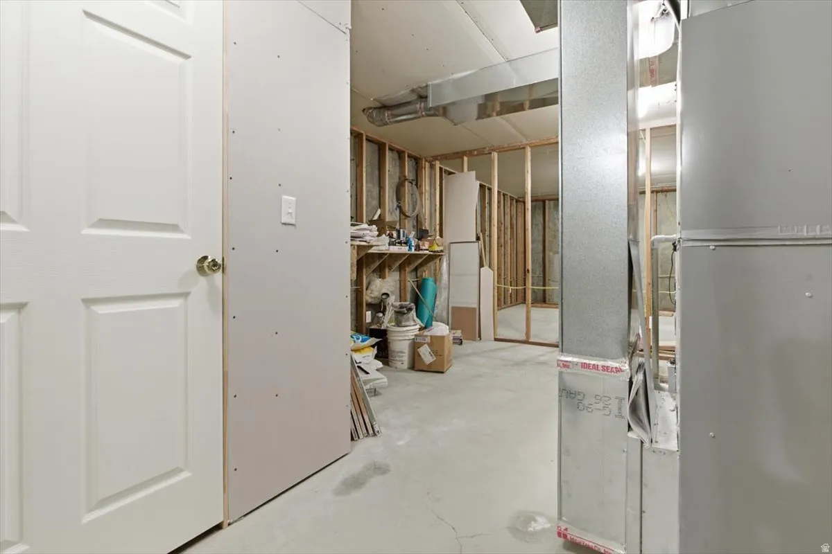 Below grade area featuring heating unit