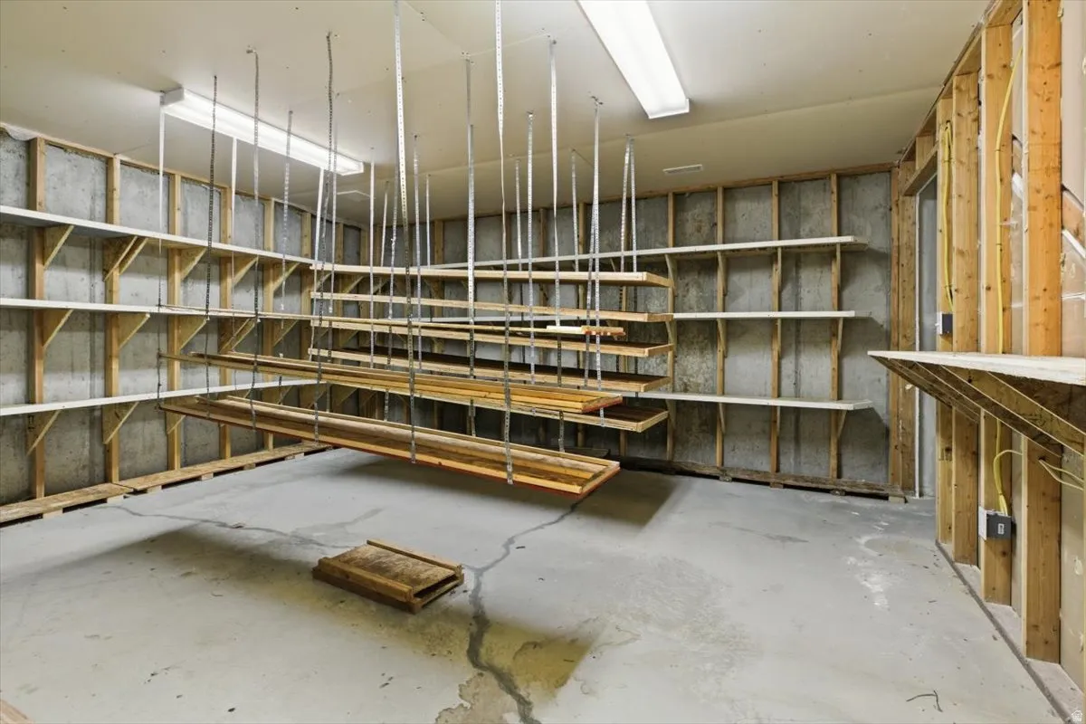 Misc room with unfinished concrete floors