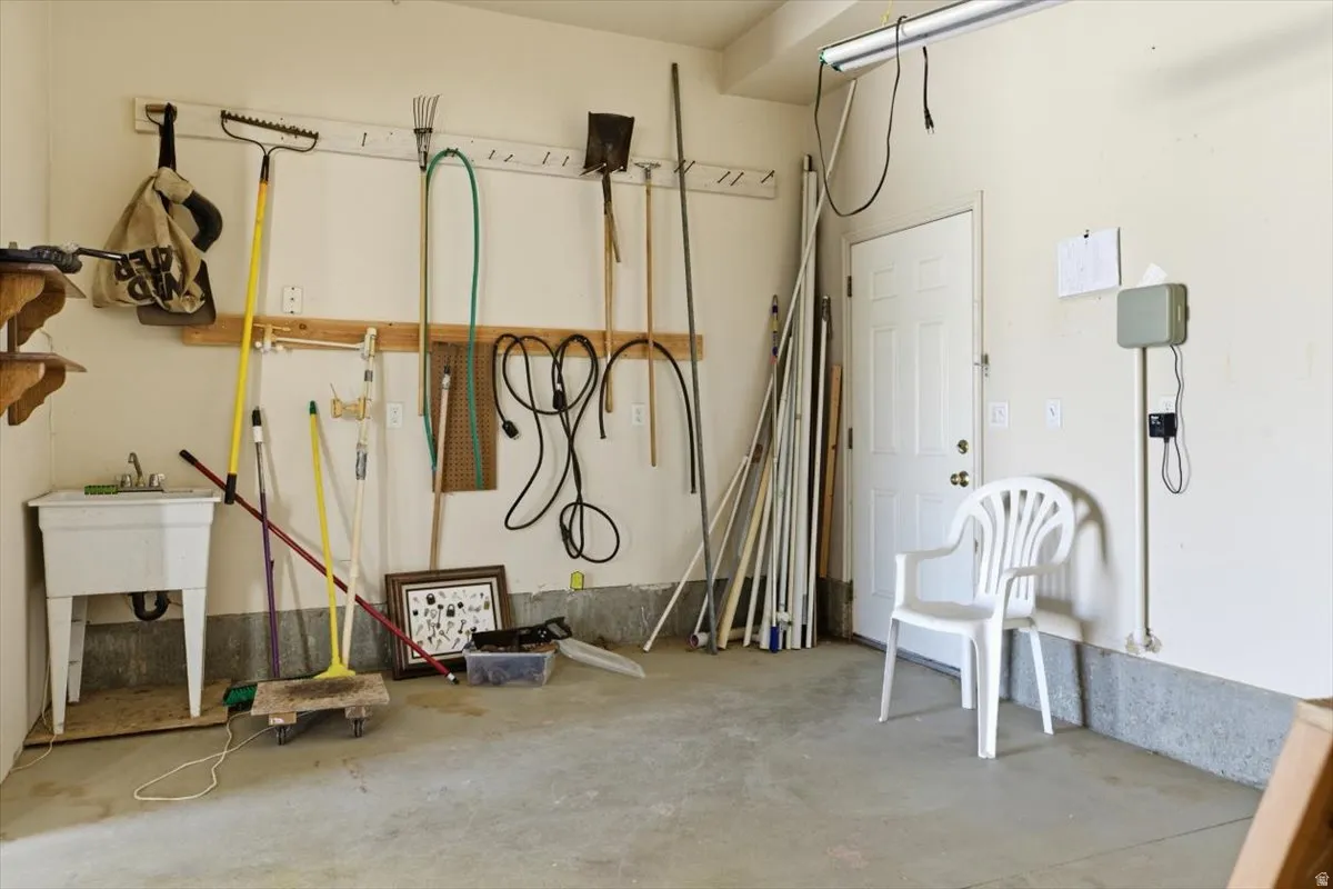 Garage featuring a sink