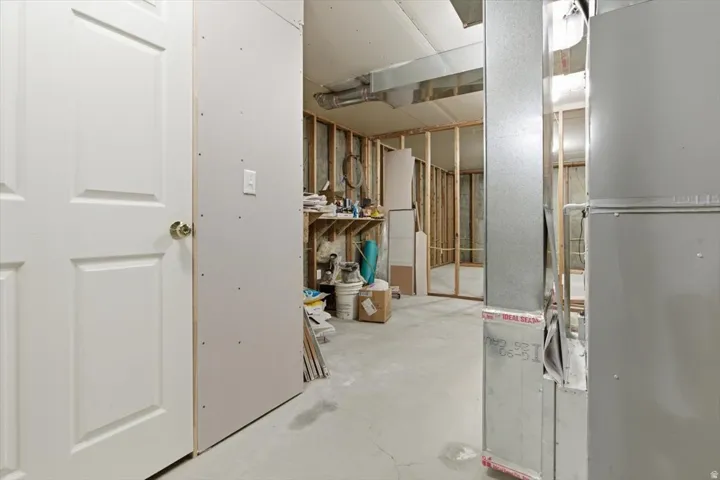 Below grade area featuring heating unit