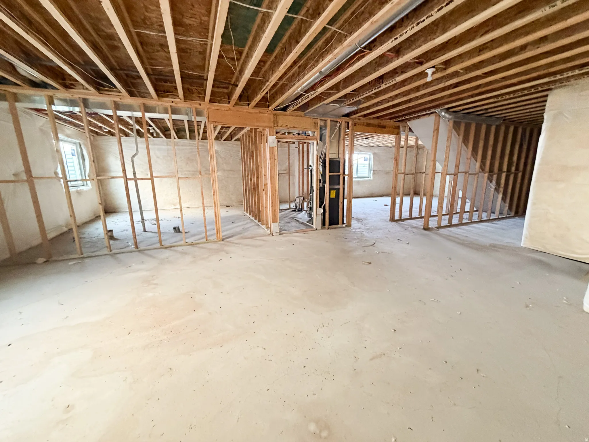 Basement featuring healthy amount of natural light