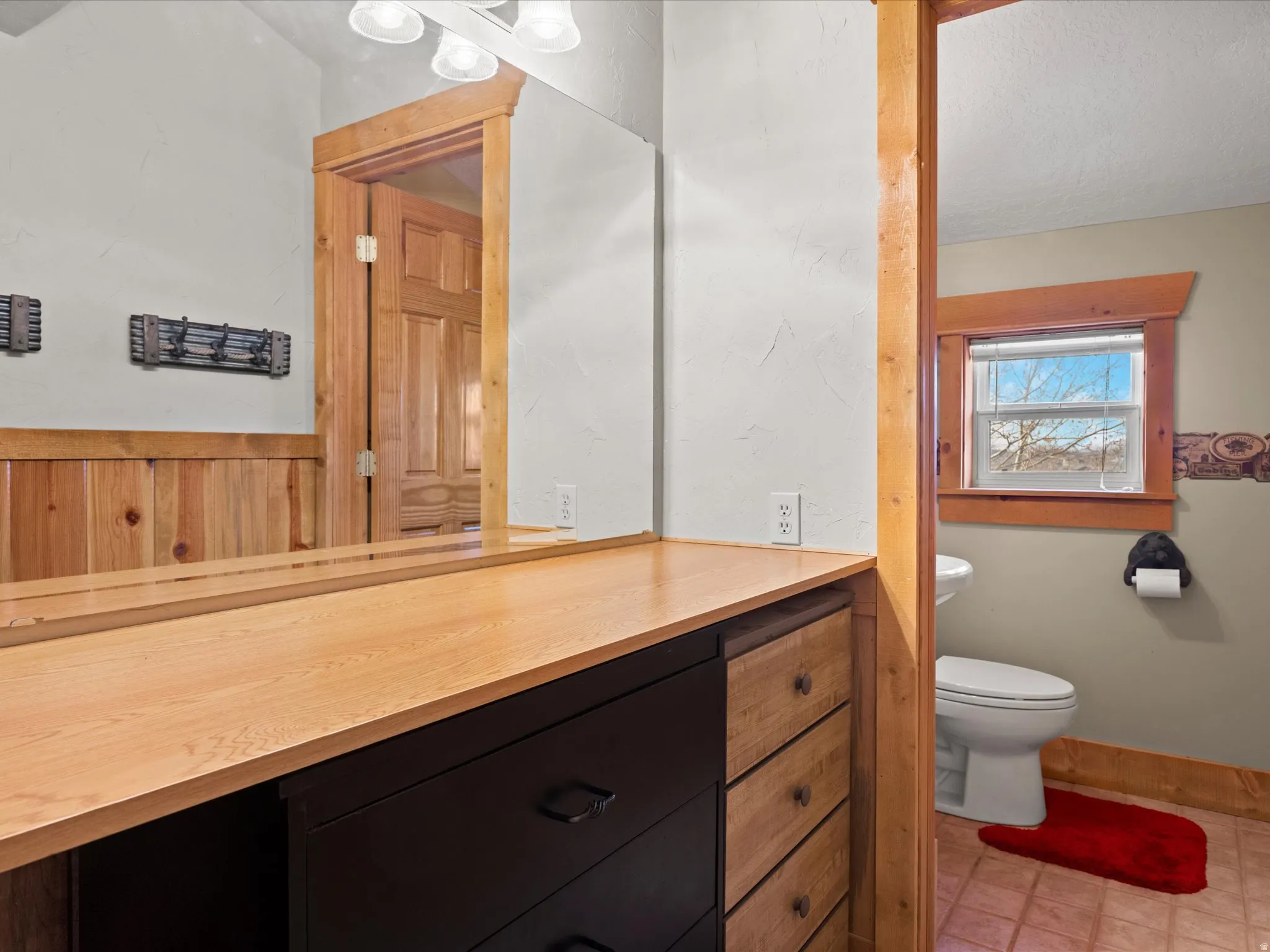 Bathroom with toilet and vanity