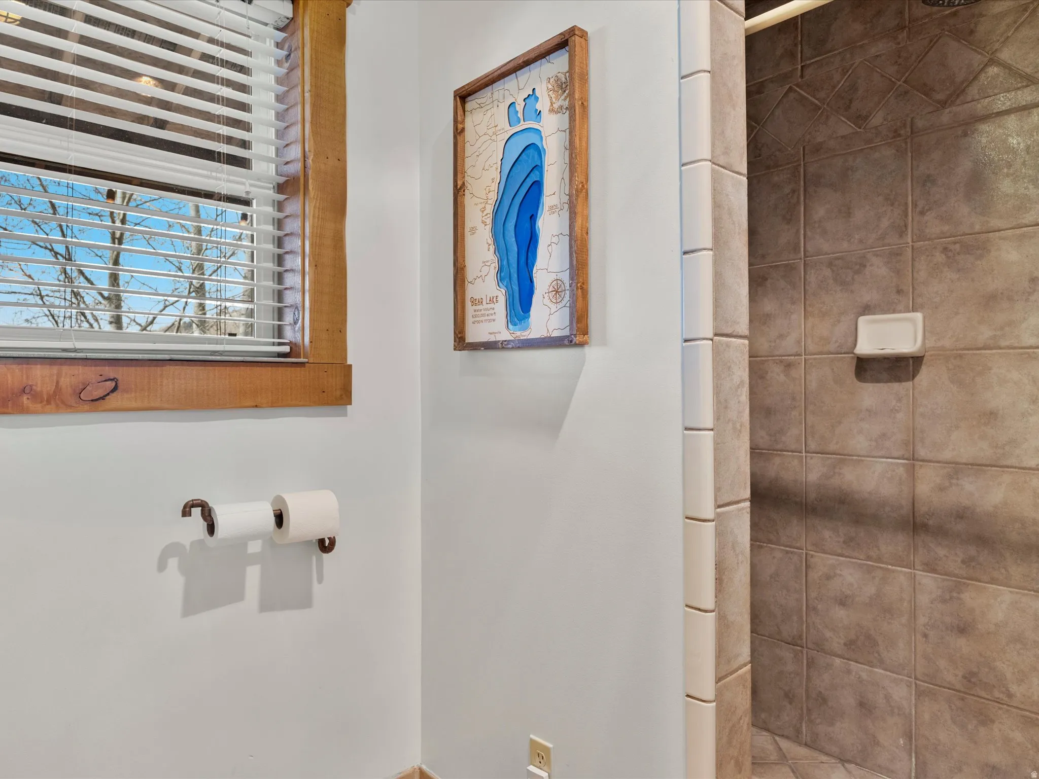 Bathroom featuring a shower stall