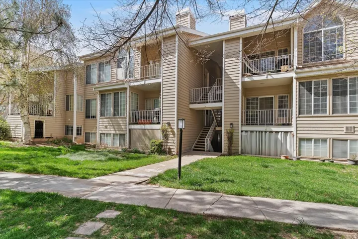 View of apartment building / complex featuring stairway