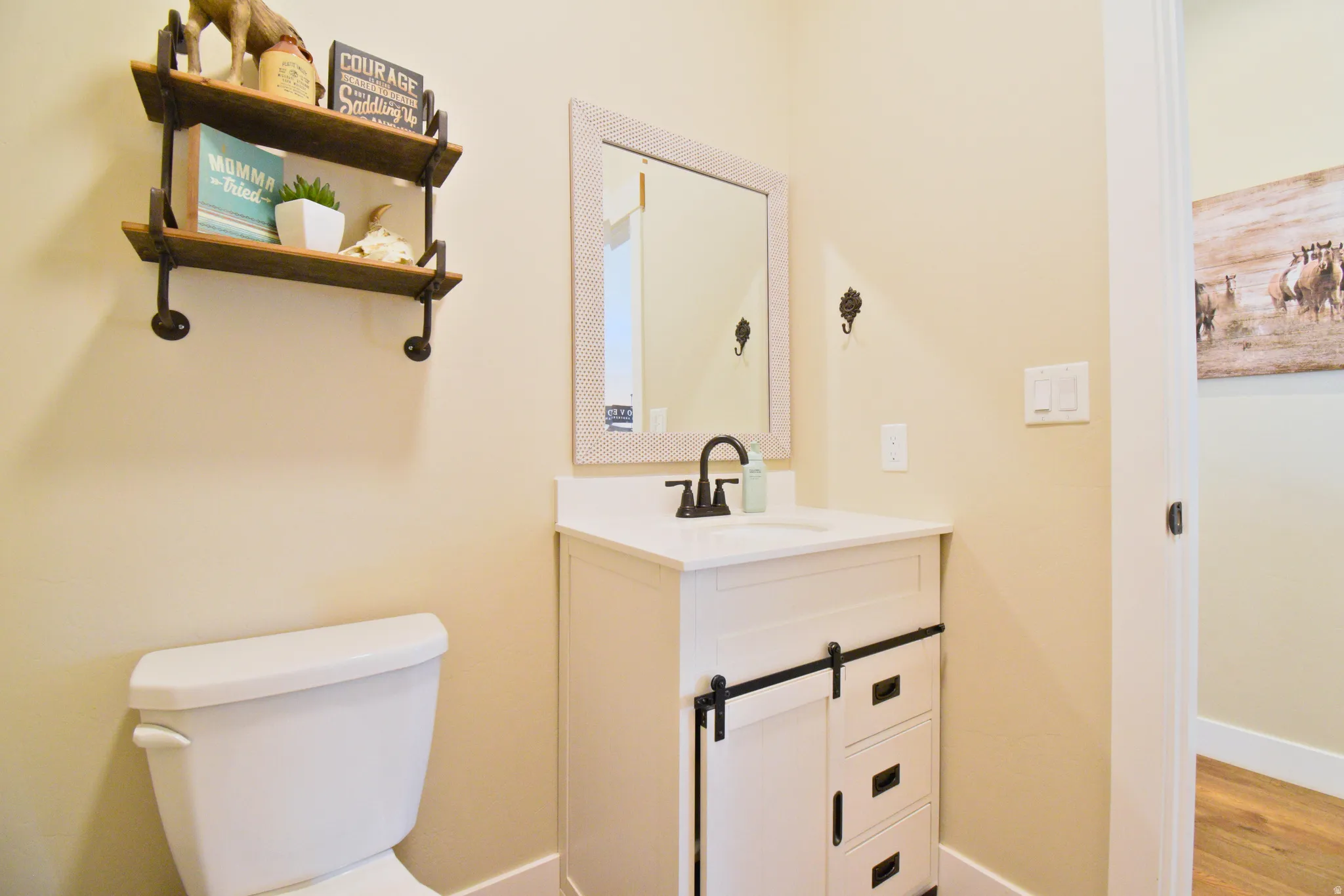 Bathroom with vanity and toilet
