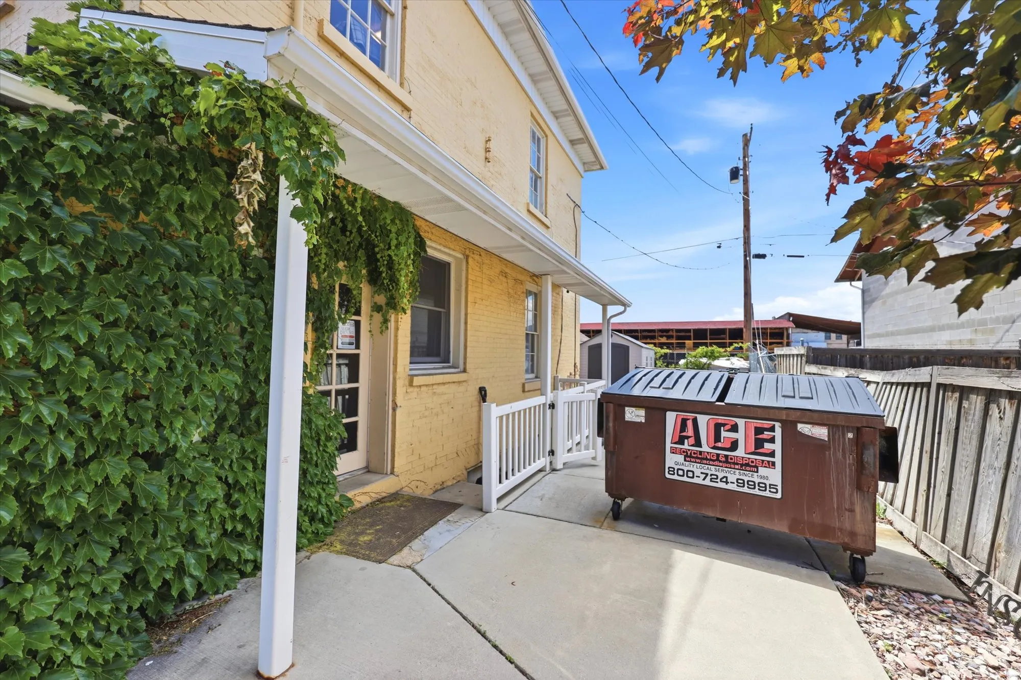 Exterior brick facade with a covered entry