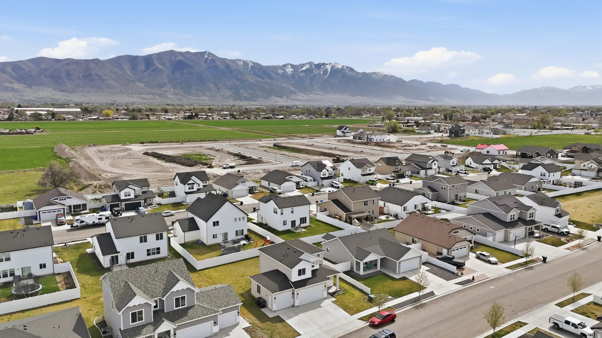 Aerial view of residential area with a mountain backdrop