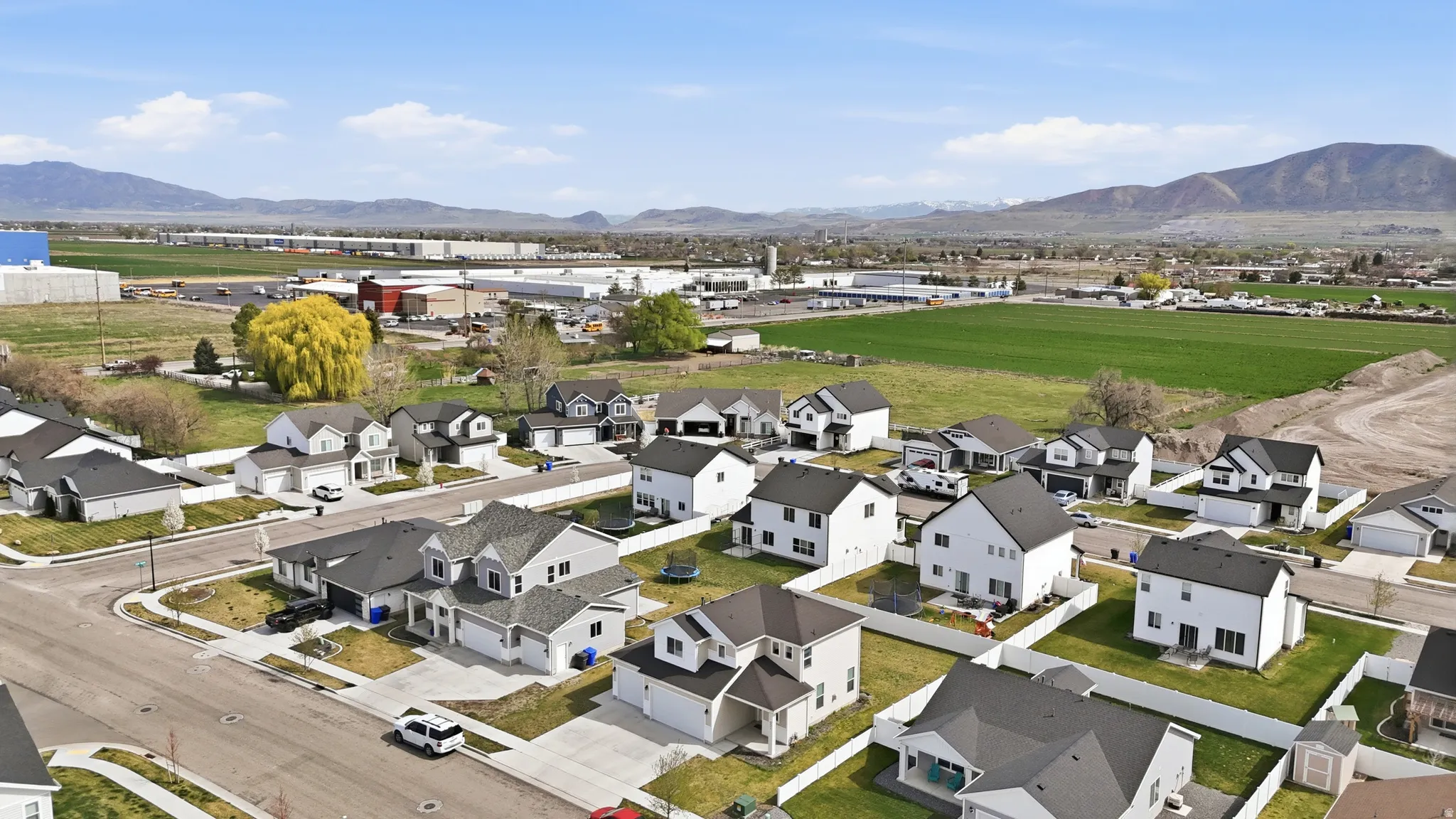 Aerial perspective of suburban area with mountains