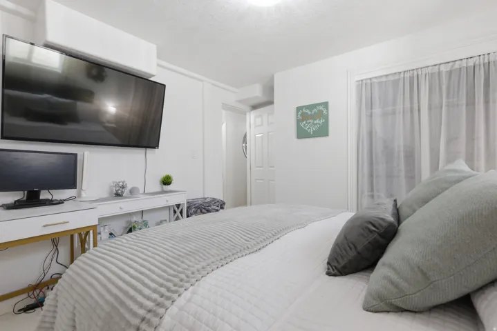 Bedroom featuring a textured ceiling