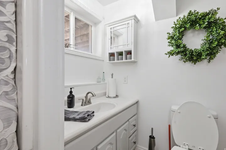 Bathroom with toilet and vanity