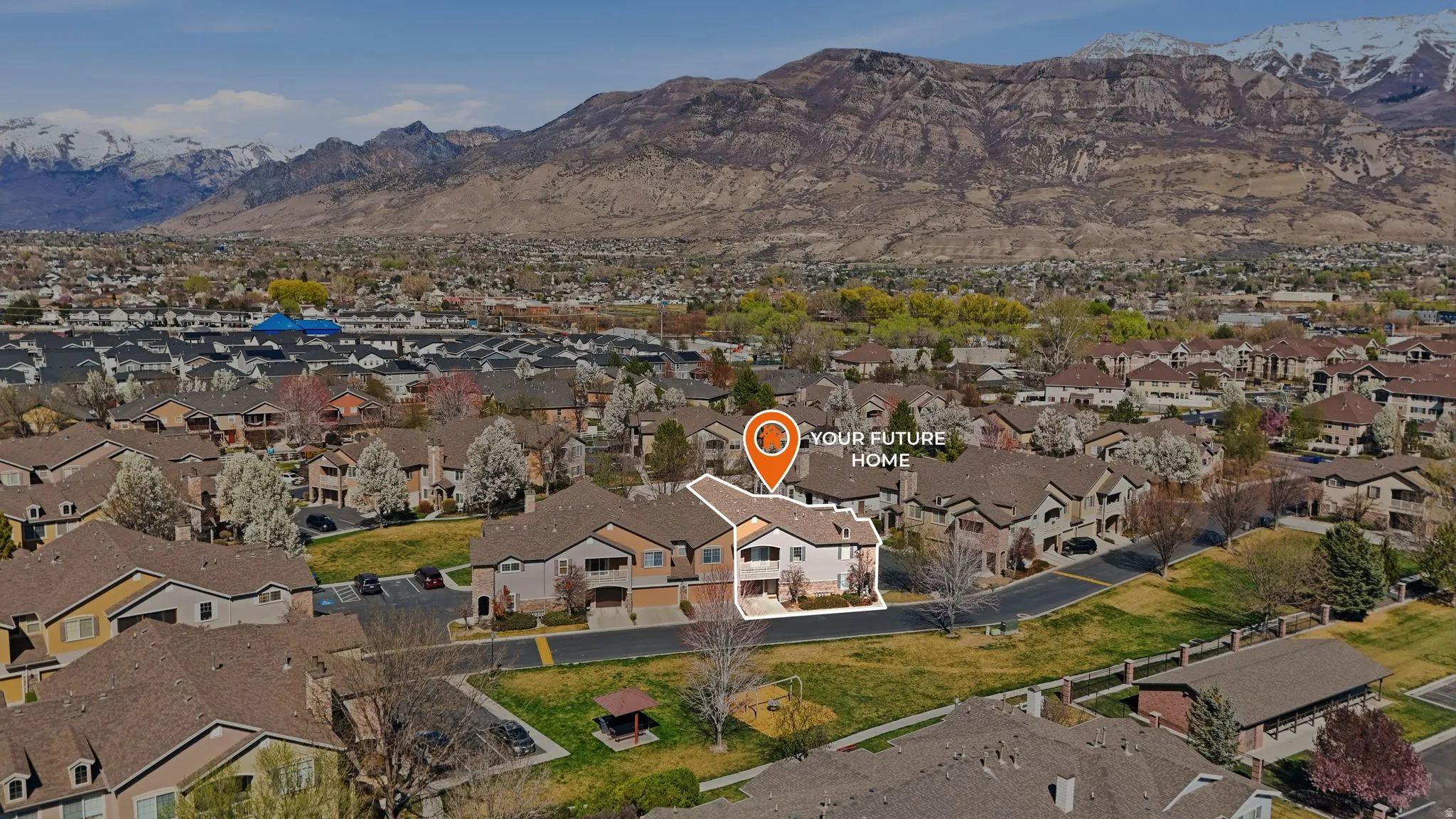 Aerial perspective of suburban area featuring mountains
