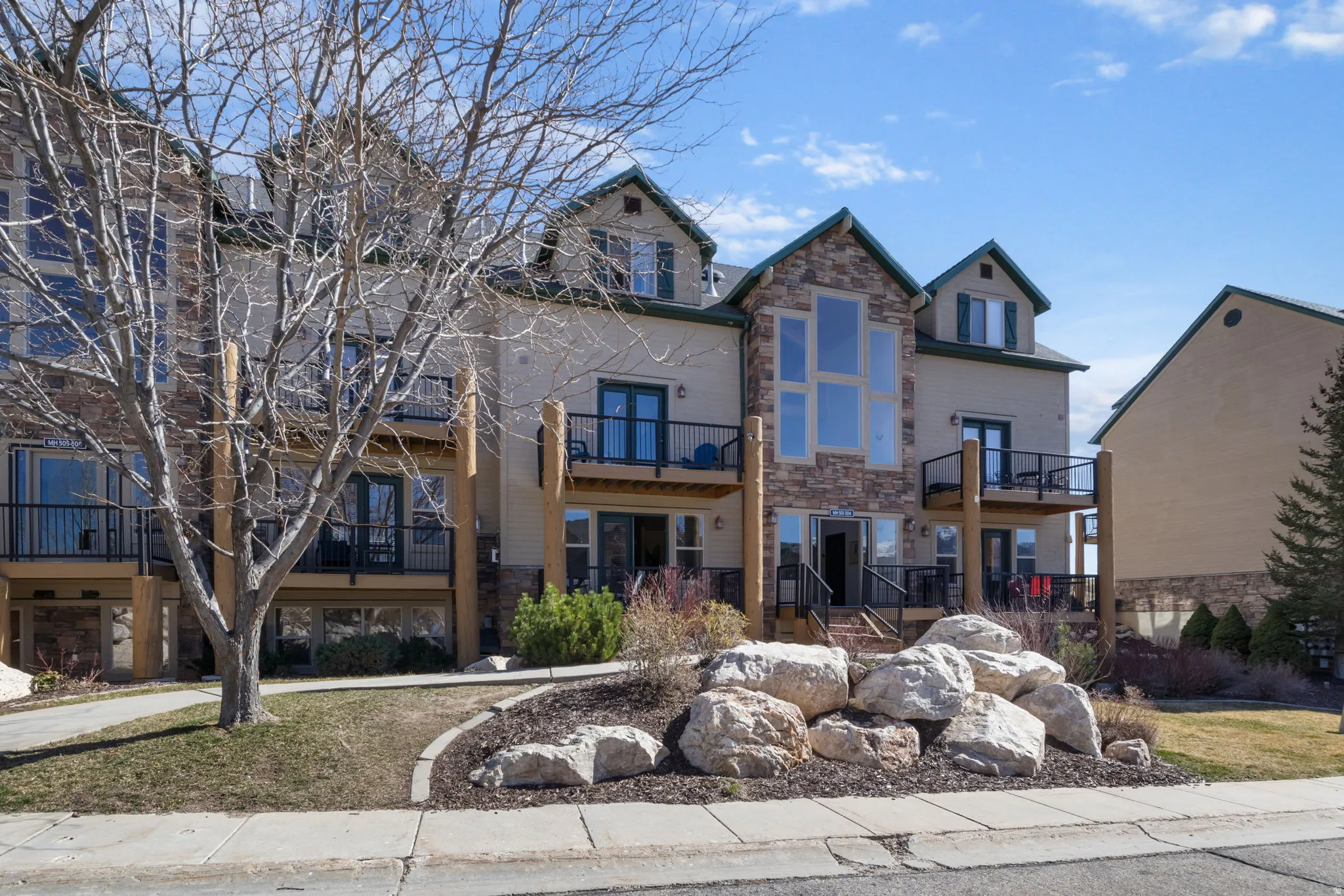 View of front of property with stone siding