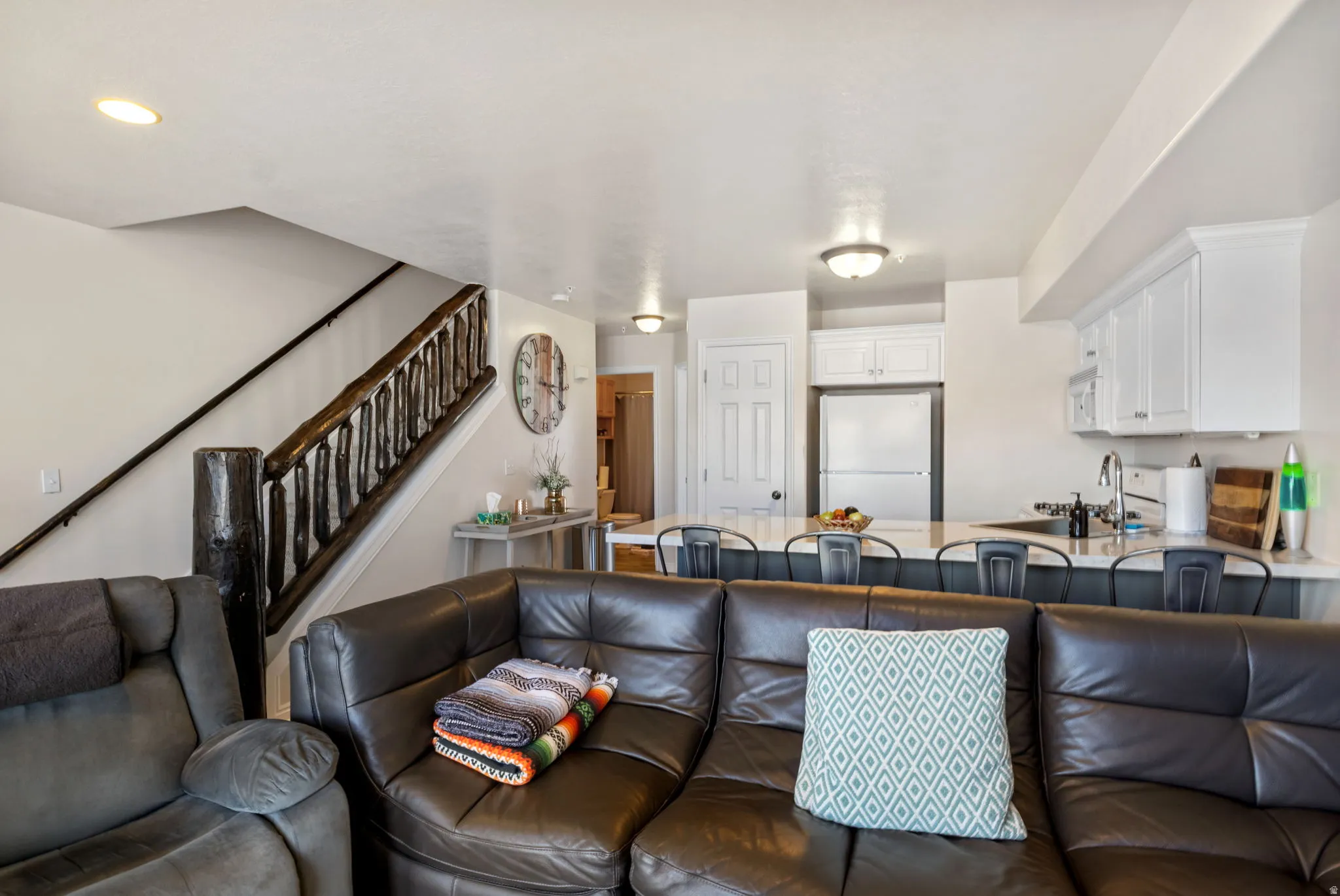 Living room featuring stairway