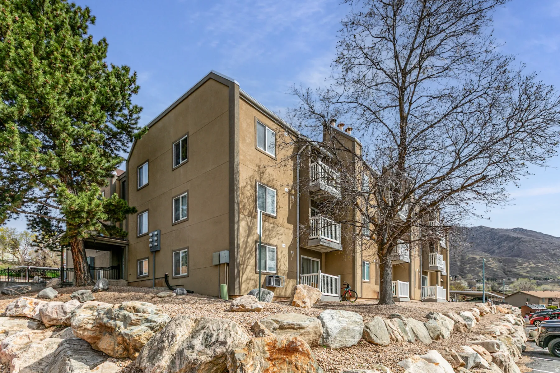 View of apartment building / complex with a mountain view