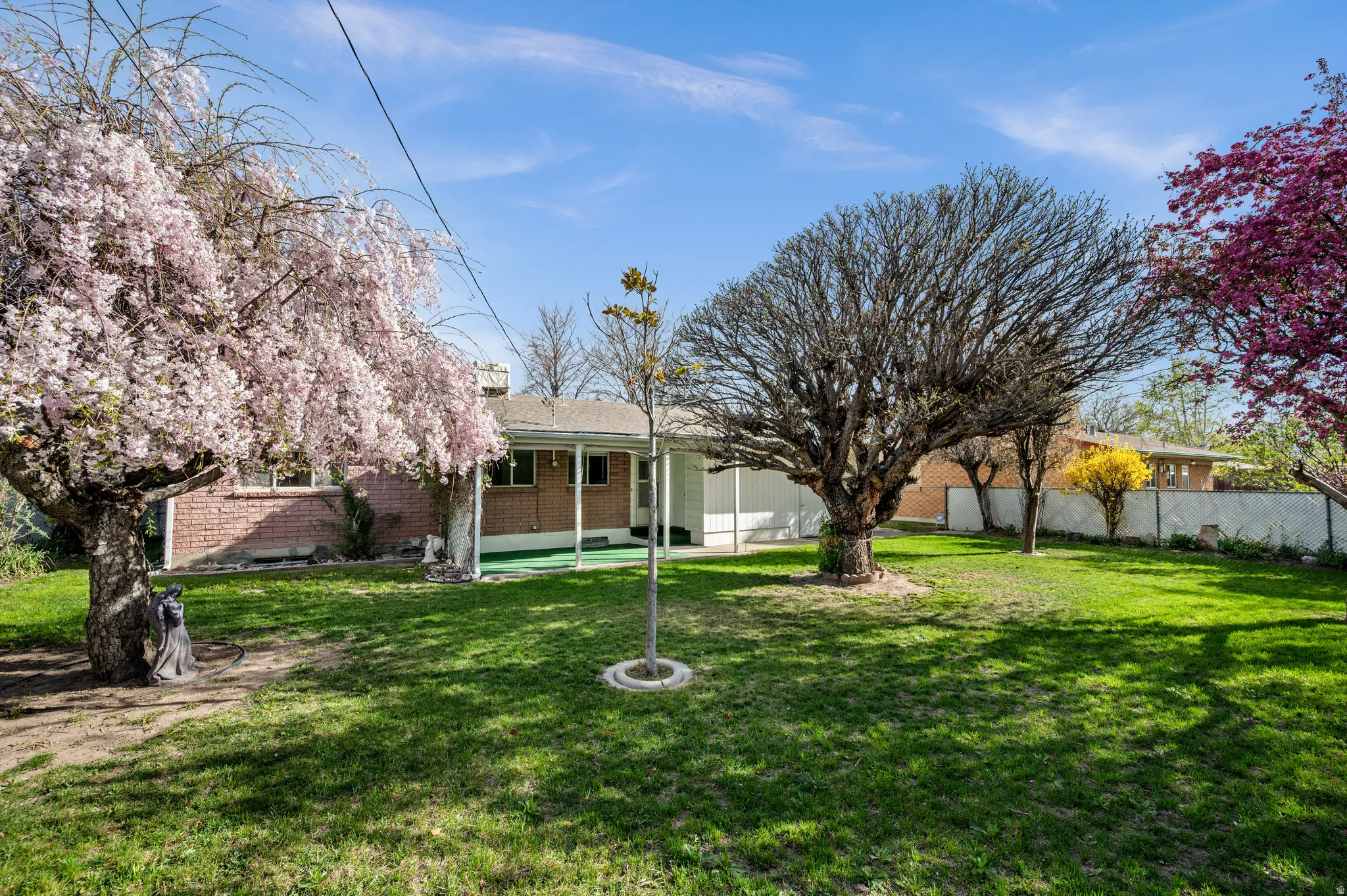 Fenced yard with a patio area