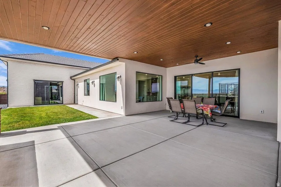 View of patio / terrace featuring ceiling fan and outdoor dining space