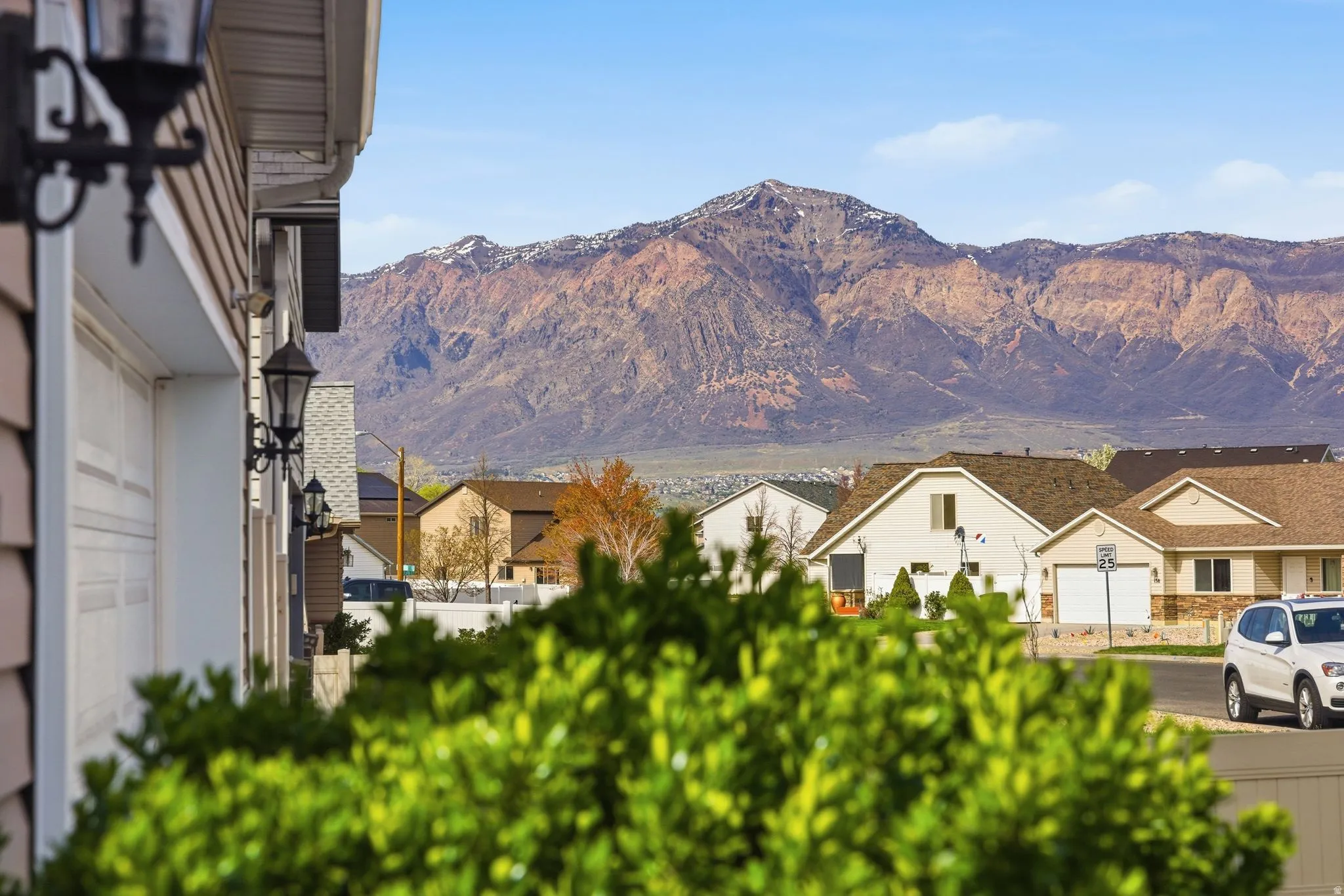 Mountain view featuring nearby suburban area