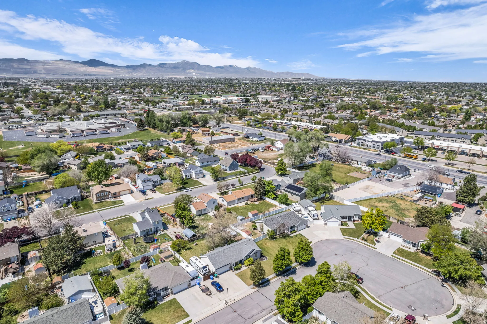 Aerial view of residential area with a mountain backdrop
