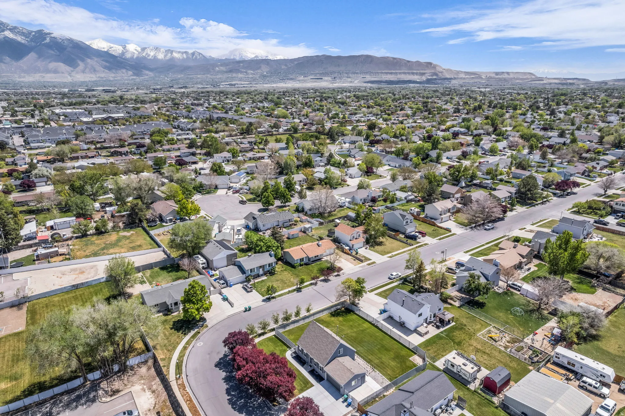 Aerial perspective of suburban area featuring mountains