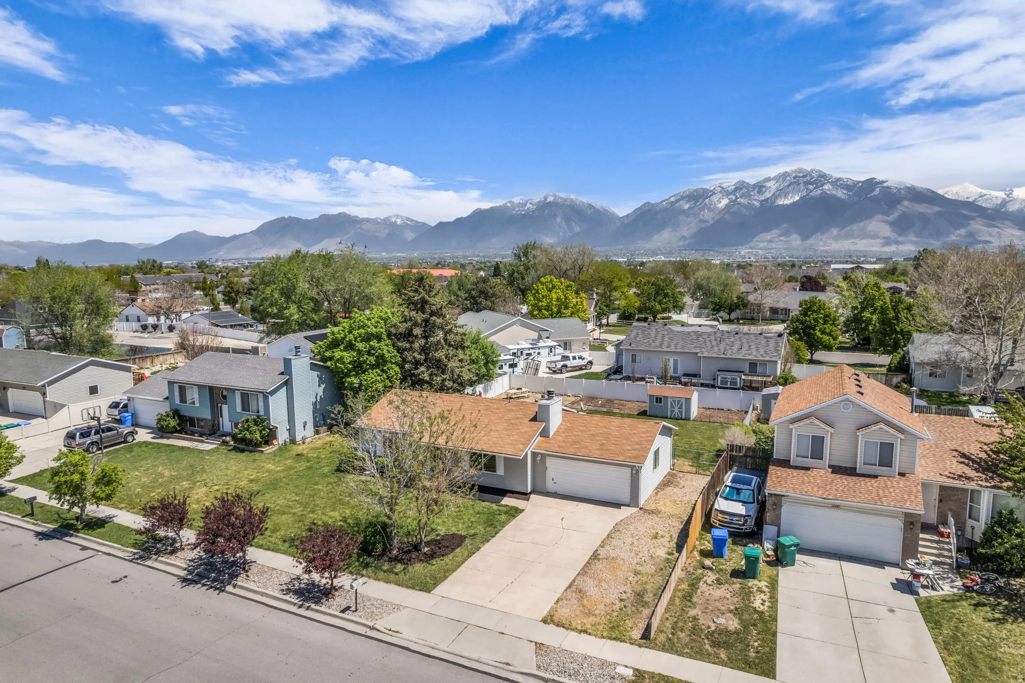 Aerial view of residential area with a mountain backdrop