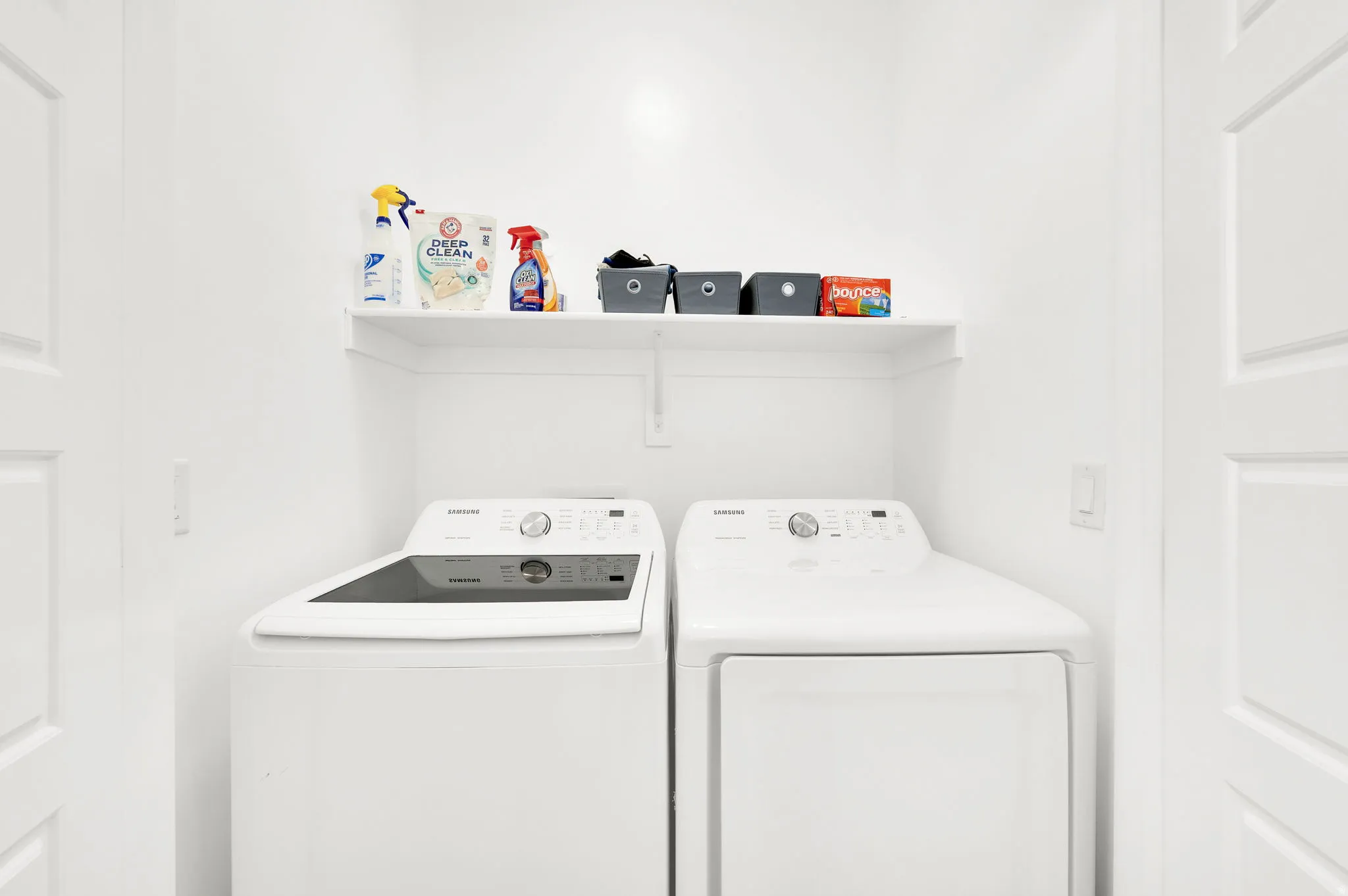 Laundry area featuring independent washer and dryer