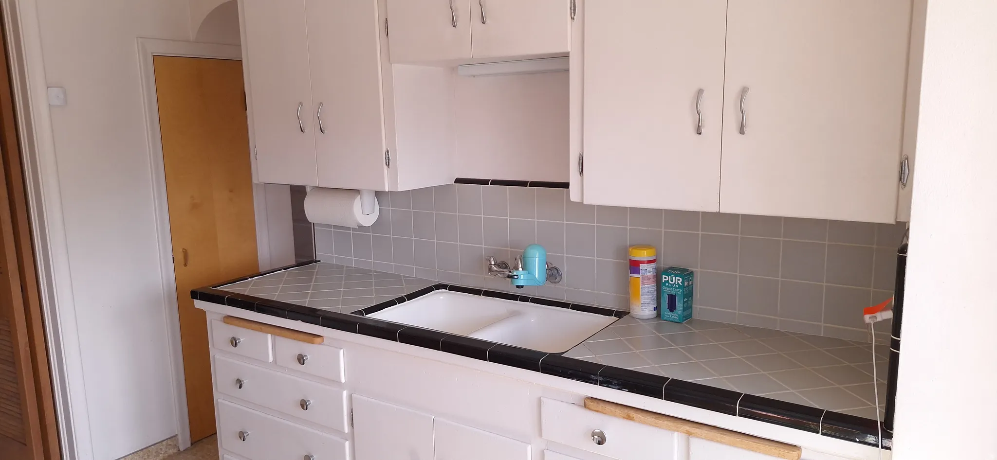 Tile countertop with two pull out cutting boards