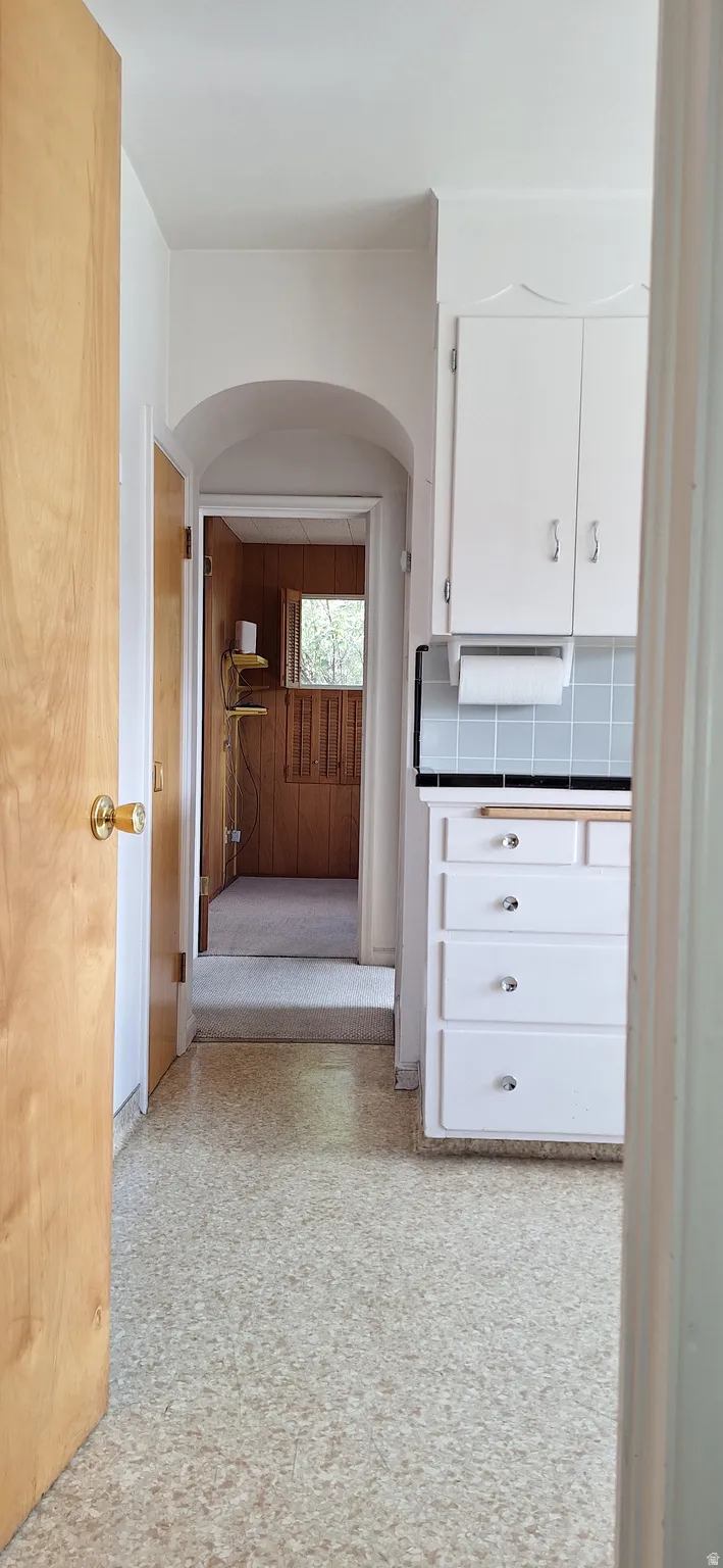View through kitchen to second bedroom