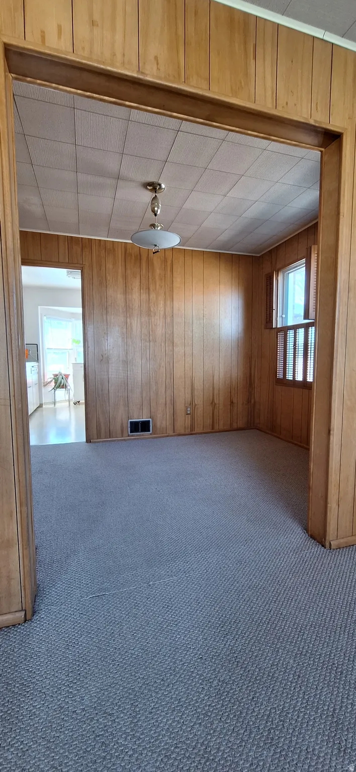 Dining room flows from living room to kitchen