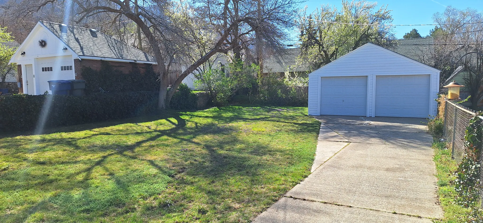 Deep, private yard with shade tree