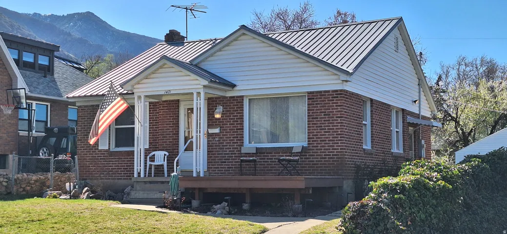 Ogden High East Bench bungalow with mountain, city and lake views.