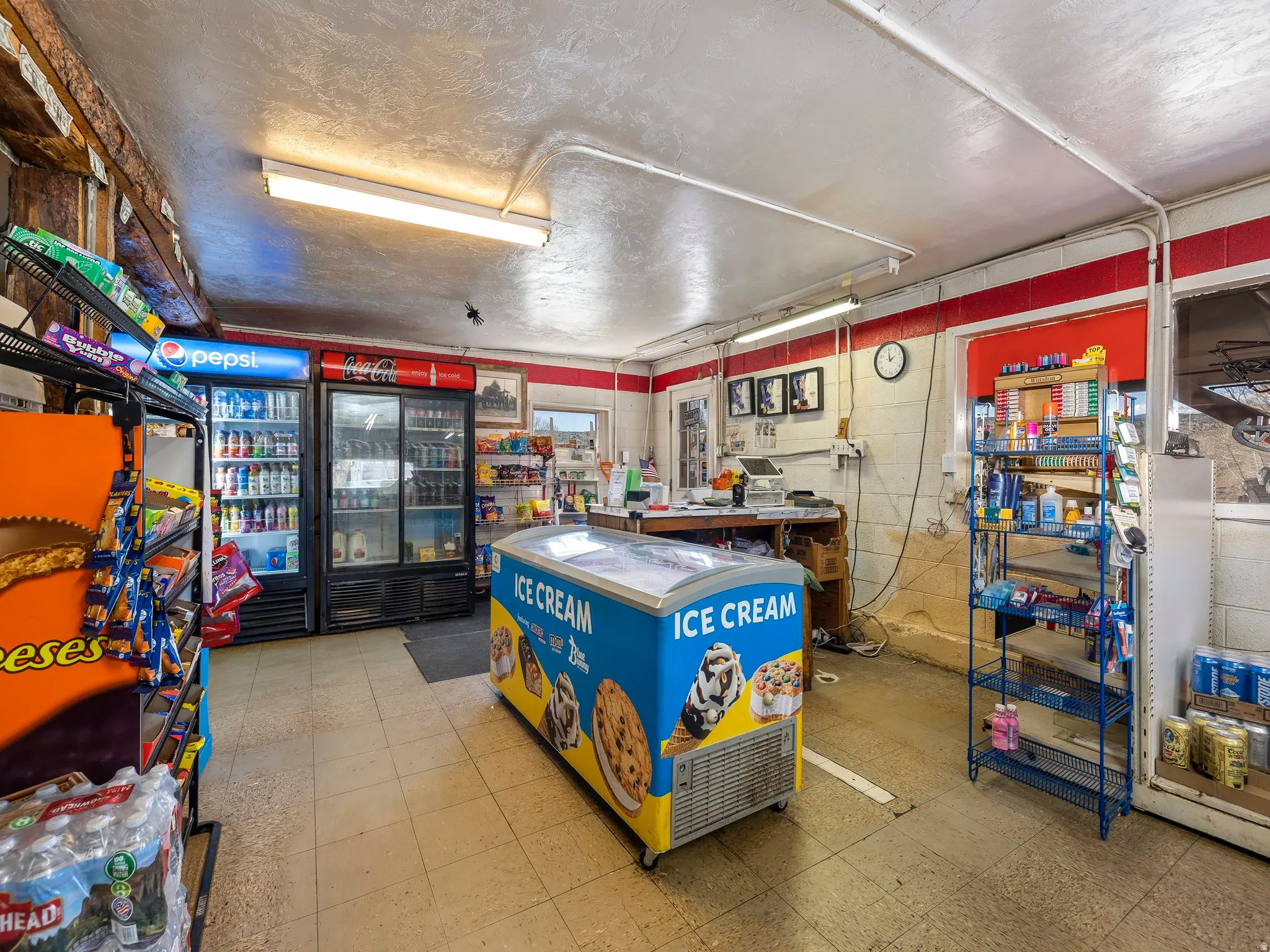 Miscellaneous room with a textured ceiling