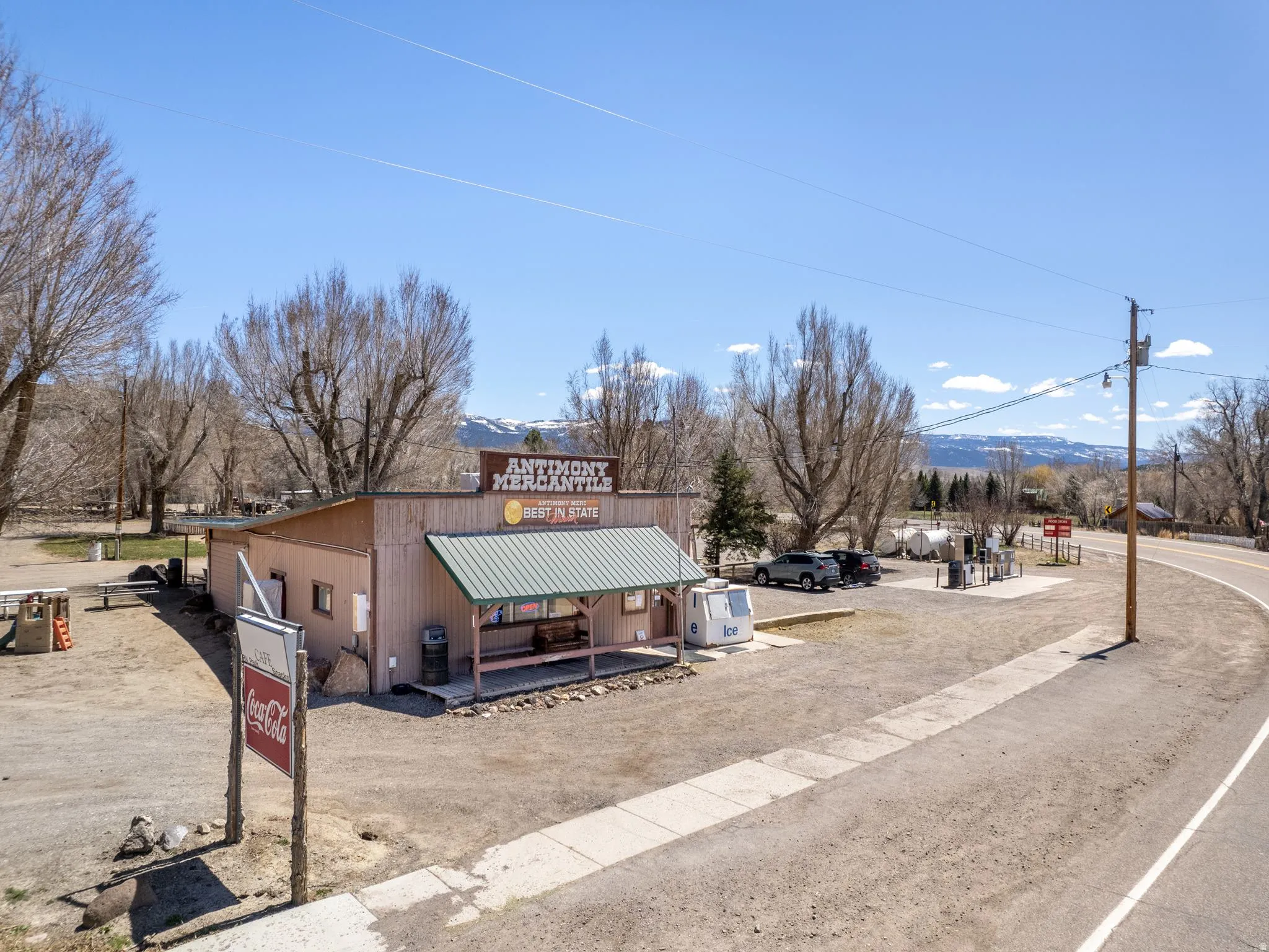 View of commercial property featuring a mountain view