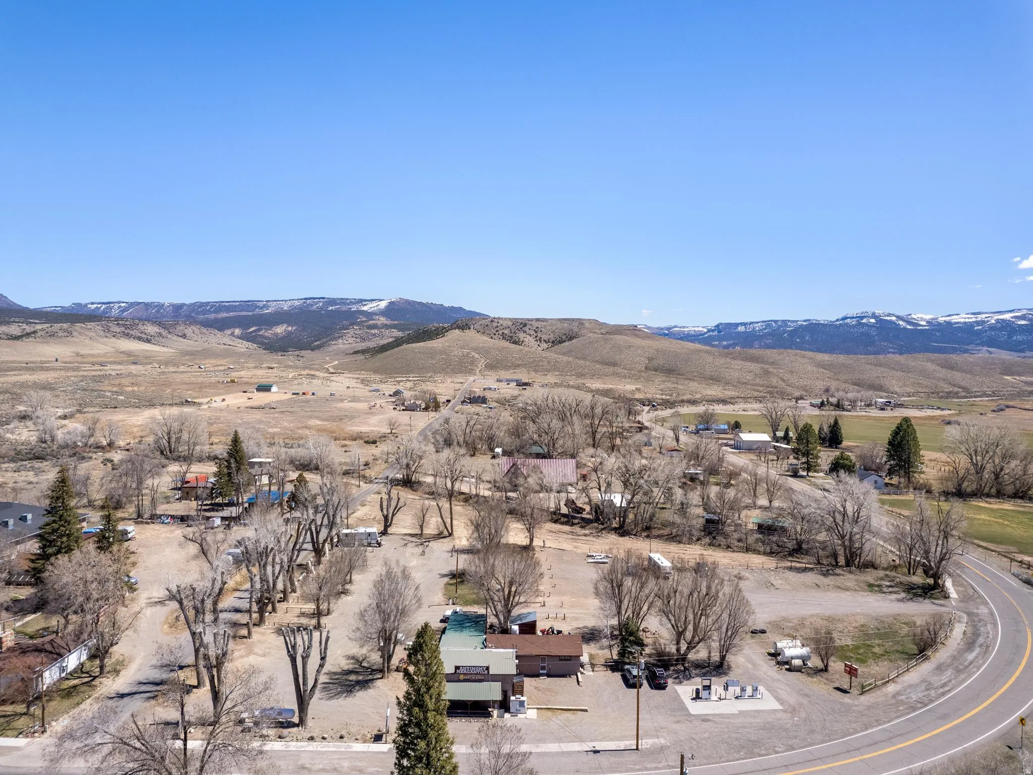View of mountain backdrop featuring rural landscape